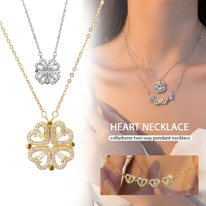 gold layered necklace — one chain with a four-leaf clover pendant and the other with small heart-shaped pendants.